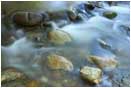 Royalty Free Stock Photo: Silky Water and Shiny Rocks