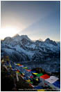 Print: Sun Rays And Prayer Flags Radiating From Mt. Everest