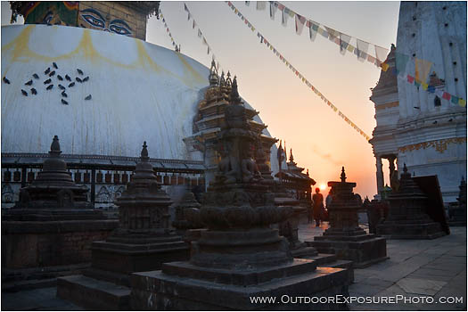 Royalty Free Stock Photo: Sun Rising On A Lone Worshiper, Swayambhunath