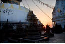 Royalty Free Stock Photo: Sun Rising On A Lone Worshiper, Swayambhunath