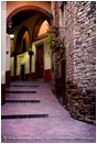 Royalty Free Stock Photo: Arch Covered Alley