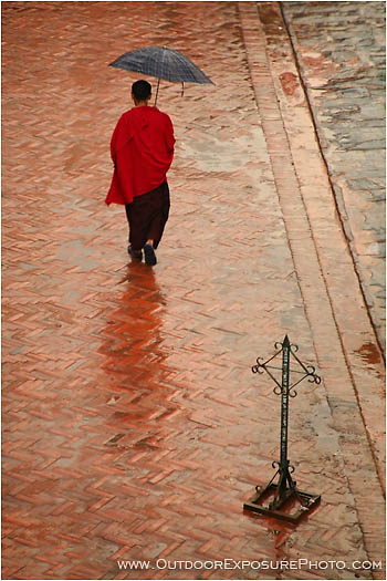 Monk In The Rain Stock Image, Katmandu, Nepal Monk In The Rain Stock Image, Katmandu, Nepal