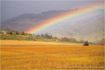 Rainbow And Tractor Stock Image, rogue valley, southern OREGON Rainbow And Tractor Stock Image, rogue valley, southern OREGON