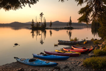 kayaks along the lake 2 stock image, waldo lake, oregon kayaks along the lake 2 stock image, waldo lake, oregon