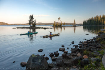 kayaks in the lake stock image, waldo lake, oregon kayaks in the lake stock image, waldo lake, oregon